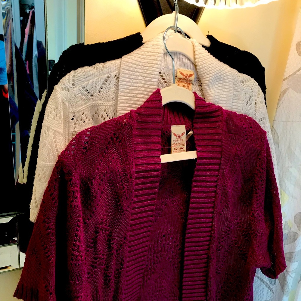 3 Casual knit shrugs. One each -white, black and maroon (burgundy?)